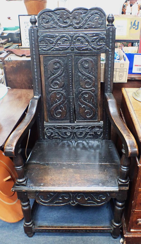 AN OAK WAINSCOT CHAIR