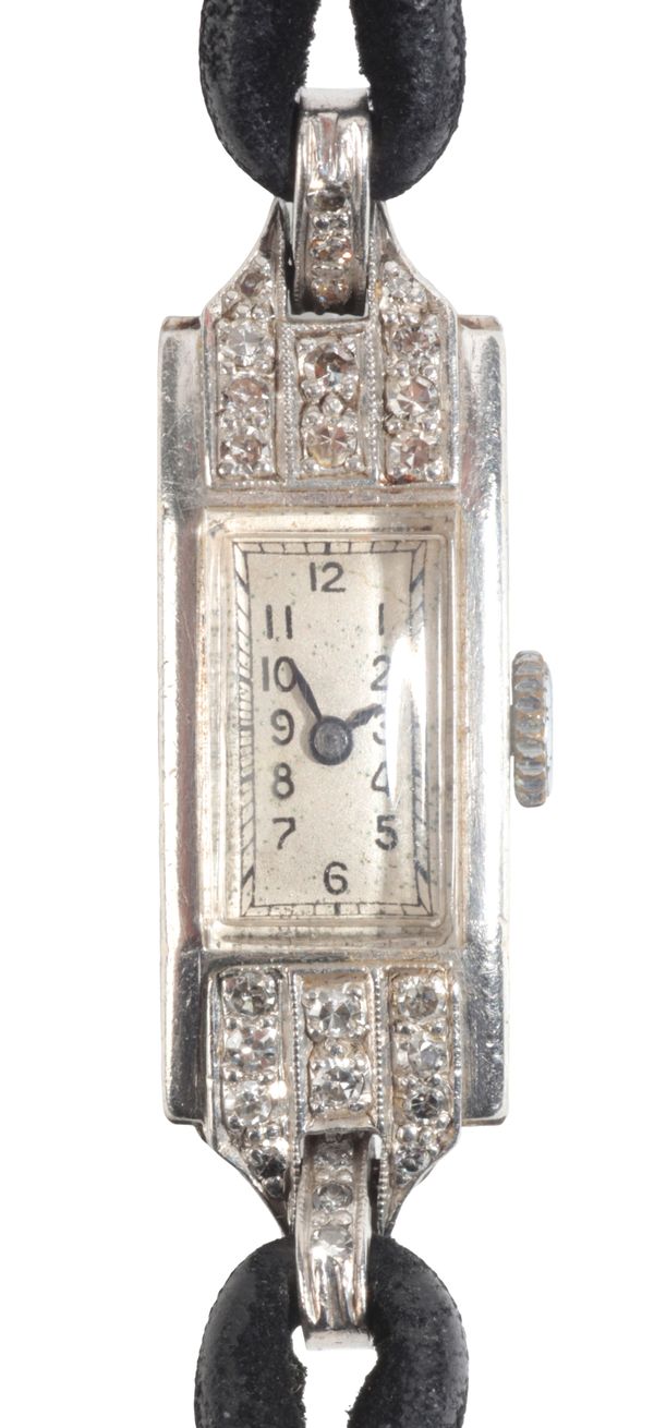 AN ART DECO PLATINUM AND DIAMOND COCKTAIL WATCH