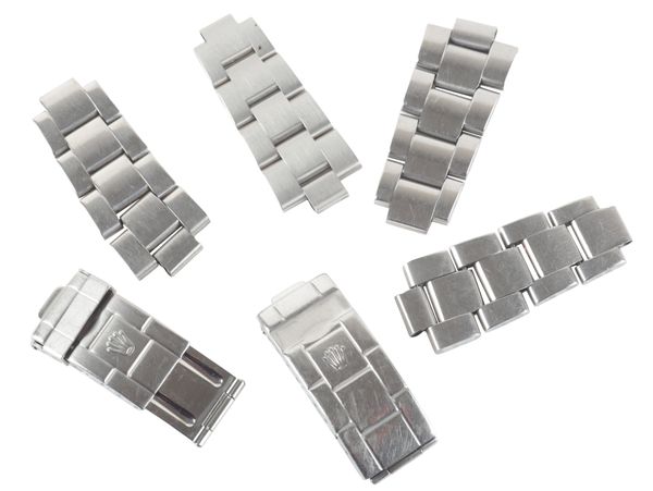 ROLEX: TWO STAINLESS STEEL WATCH BRACELET CLASPS