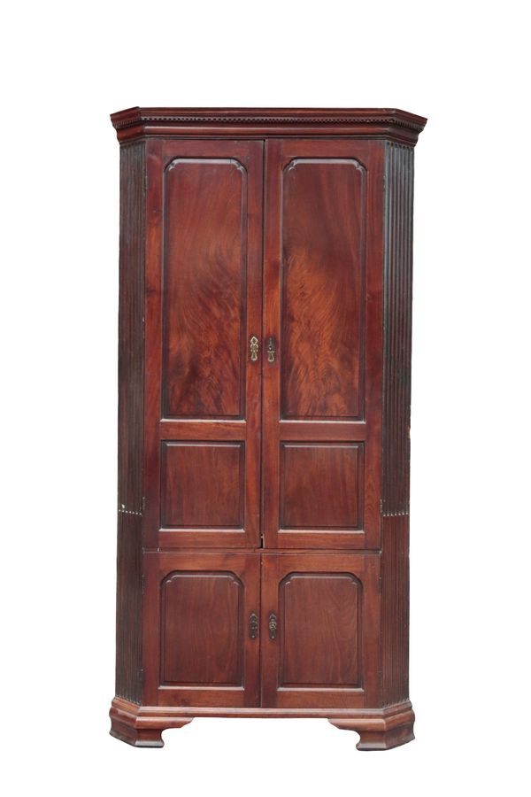 A GEORGE II RED WALNUT CORNER CUPBOARD