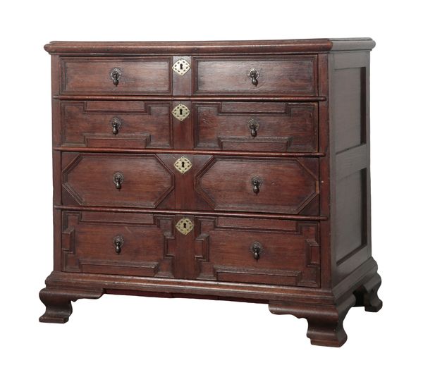 A CHARLES II OAK CHEST OF DRAWERS