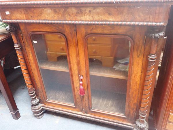 A VICTORIAN WALNUT GLAZED LOW BOOKCASE