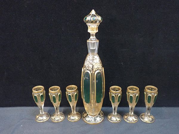 A 19th CENTURY BOHEMIAN OVERLAID GLASS LIQUEUR SET