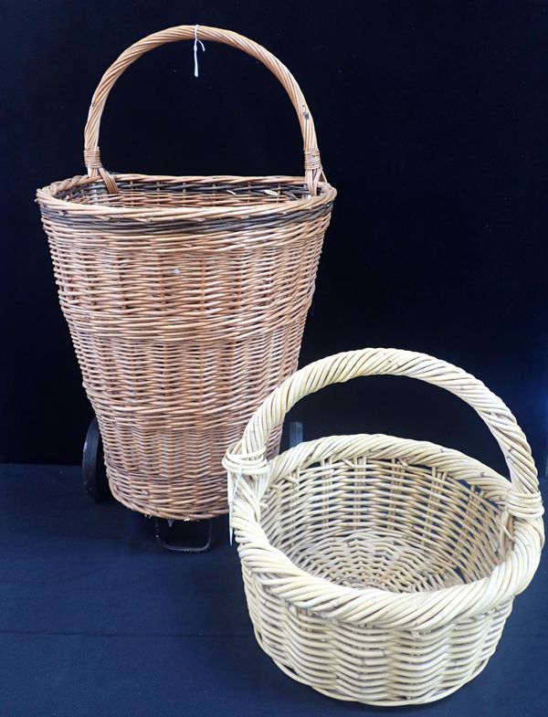 A MODERN BASKET ON WHEELS, FOR LOGS