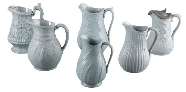 A GROUP OF SIX VICTORIAN PALE BLUE GLAZED JUGS