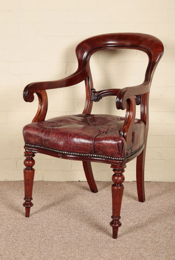 AN EARLY VICTORIAN MAHOGANY DESK CHAIR