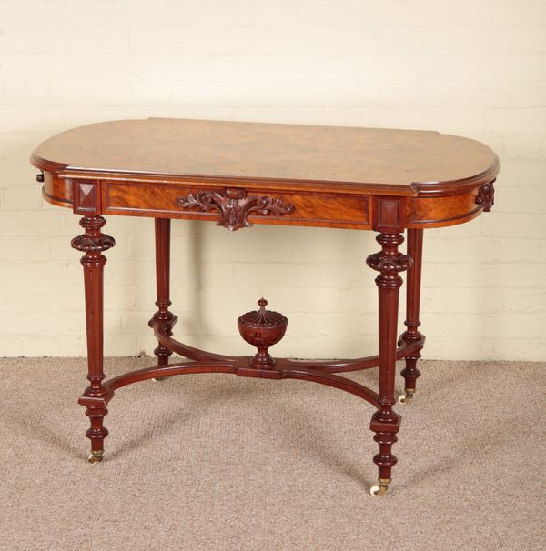 A VICTORIAN WALNUT CENTRE TABLE