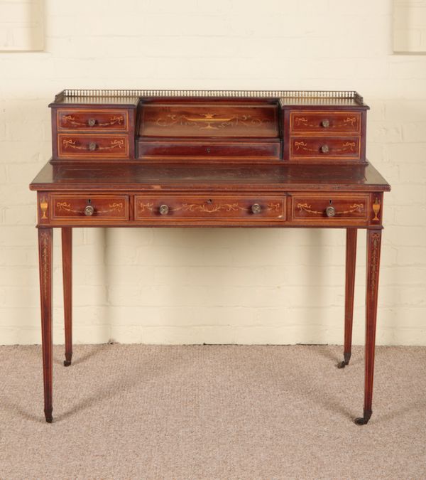 A MAHOGANY AND MARQUETRY DESK BY EDWARDS AND ROBERTS