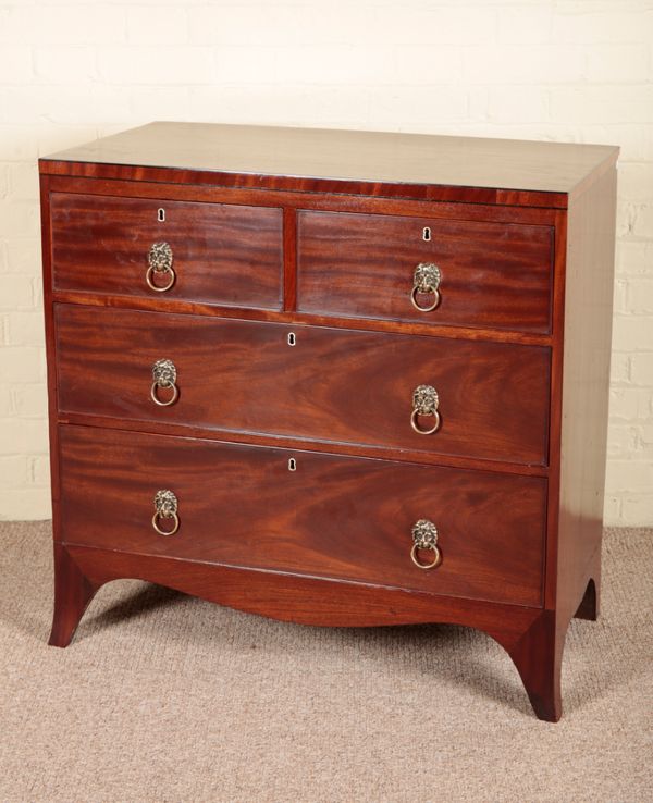 A REGENCY MAHOGANY CHEST OF DRAWERS