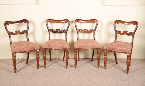 A SET OF FOUR VICTORIAN ROSEWOOD DINING CHAIRS