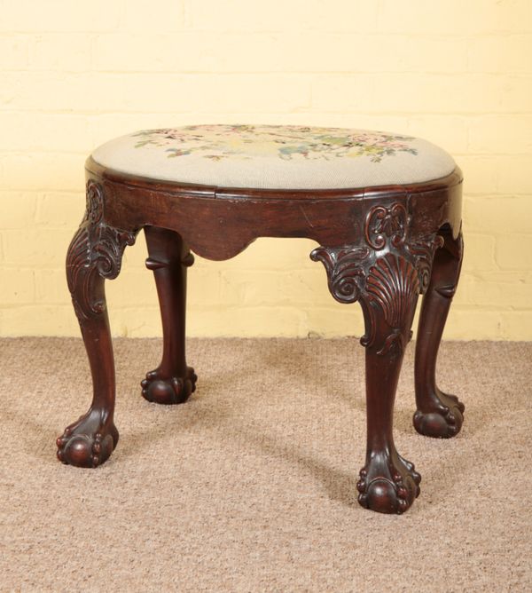 A GEORGE II STYLE MAHOGANY STOOL