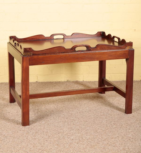 A GEORGE III STYLE MAHOGANY TRAY TOP COFFEE TABLE