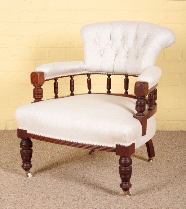 A LATE VICTORIAN MAHOGANY ARMCHAIR