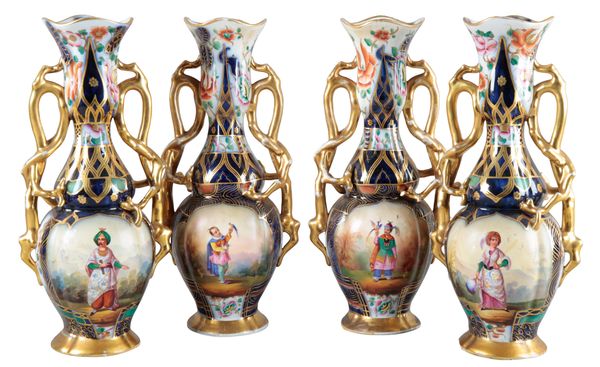 TWO PAIRS OF CONTINENTAL PORCELAIN VASES