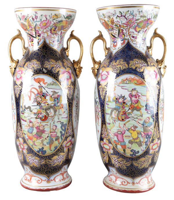 A PAIR OF CONTINENTAL PORCELAIN BALUSTER VASES