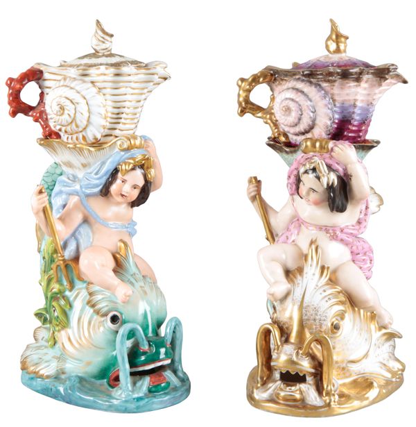 TWO SIMILAR CONTINENTAL PORCELAIN FIGURAL VEILLEUSES