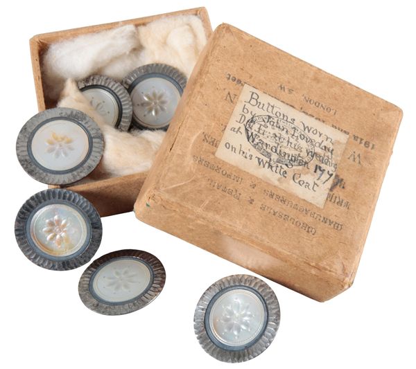 A SET OF SIX GEORGE III POLISHED STEEL AND MOTHER OF PEARL BUTTONS