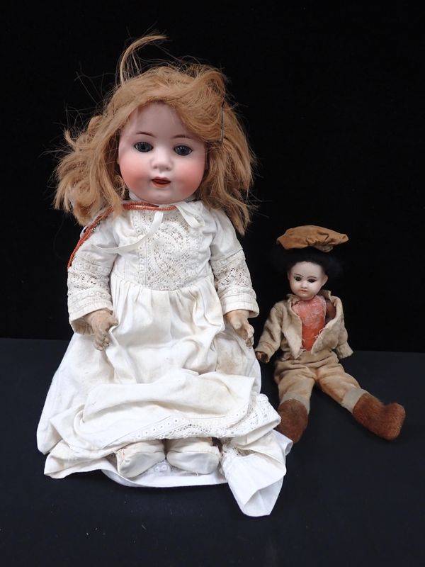 A BISQUE HEADED DOLL; 'HEUBACH. KOPPELSDORF. 300. 7'