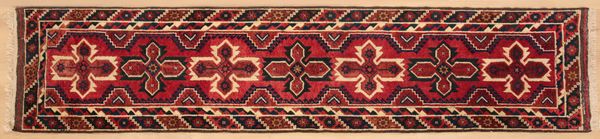 A MIDDLE EASTERN CARPET RUNNER