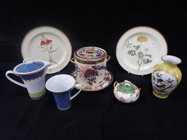 TWO CREAMWARE PLATES WITH BOTANICAL DECORATION