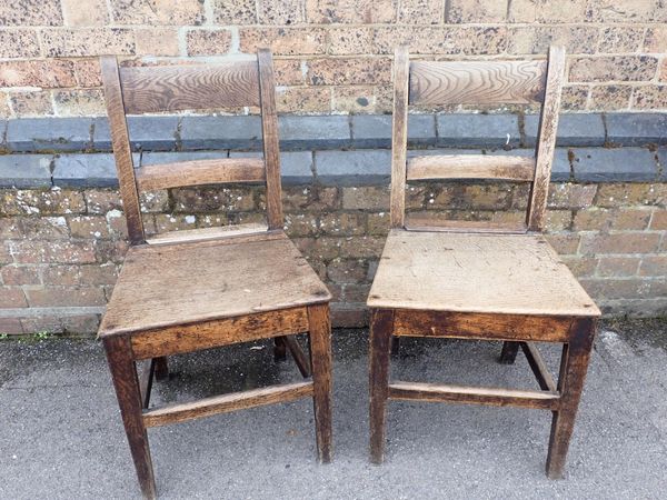 A PAIR OF PLAIN OAK COUNTRY CHAIRS