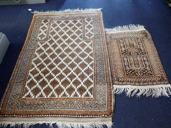 TWO SMALL BELUCH PRAYER RUGS