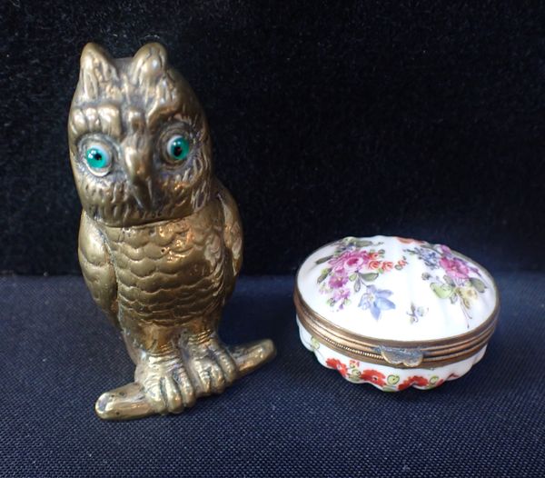 A BRASS NOVELTY OWL MATCH HOLDER