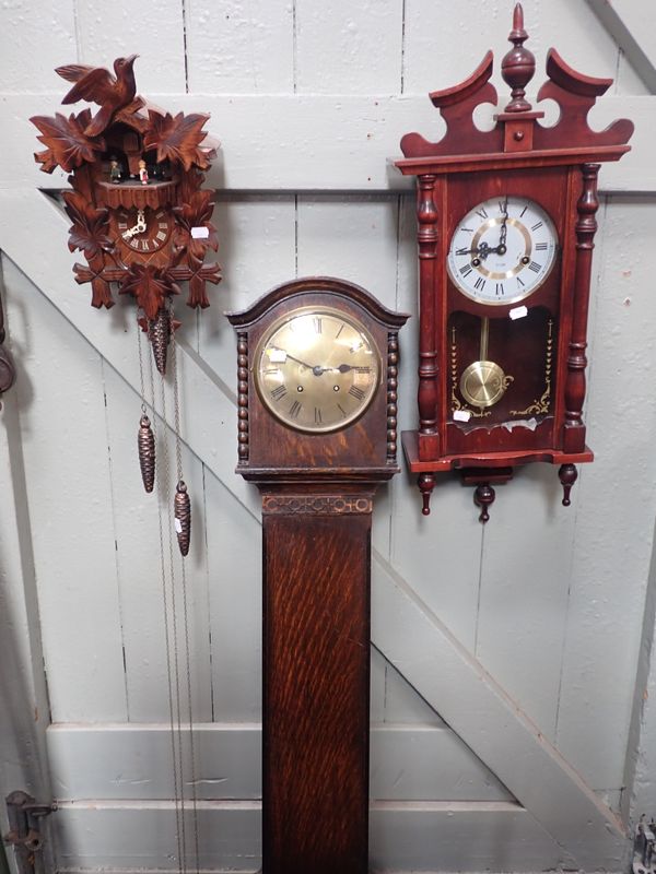 A 1930s OAK 'GRANDMOTHER' CLOCK, A CUCKOO CLOCK