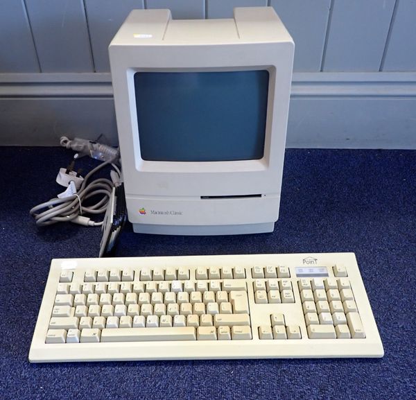 AN APPLE MACINTOSH CLASSIC COMPUTER