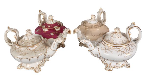 A GROUP OF FOUR H & R DANIEL SECOND BELL SHAPE TEAPOTS