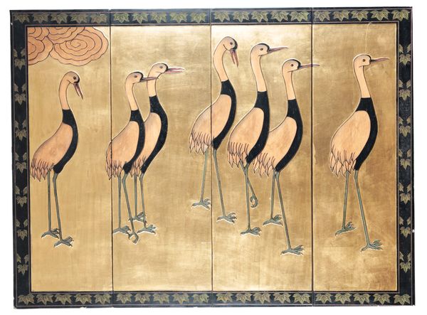 A JAPANESE BLACK LACQUER AND GILT SCREEN