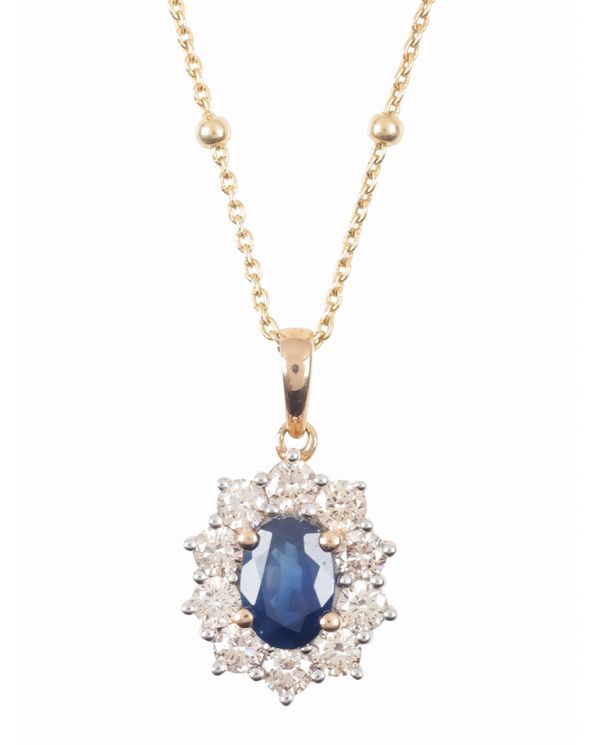 A SAPPHIRE AND DIAMOND PENDANT NECKLACE