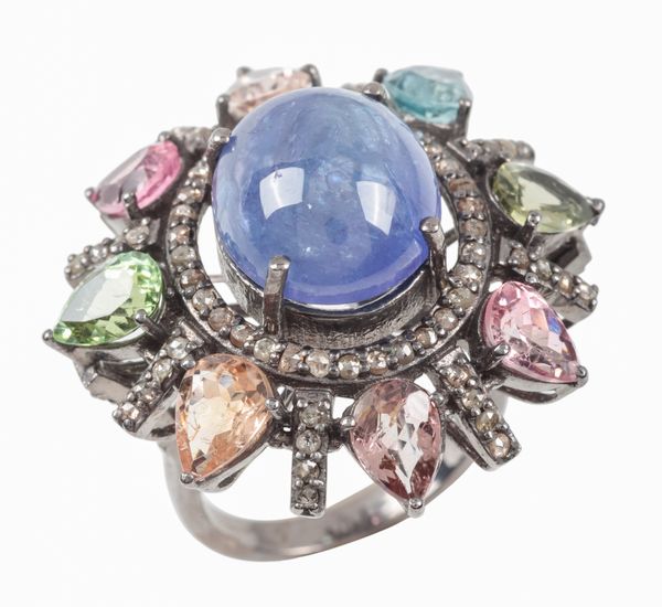 A CLUSTER RING SET WITH TOURMALINE, KYANITE AND DIAMONDS