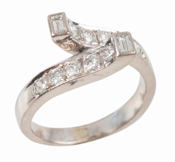 A DIAMOND SET CROSSOVER RING