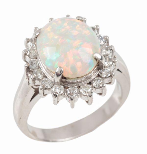 AN OPAL AND DIAMOND CLUSTER RING