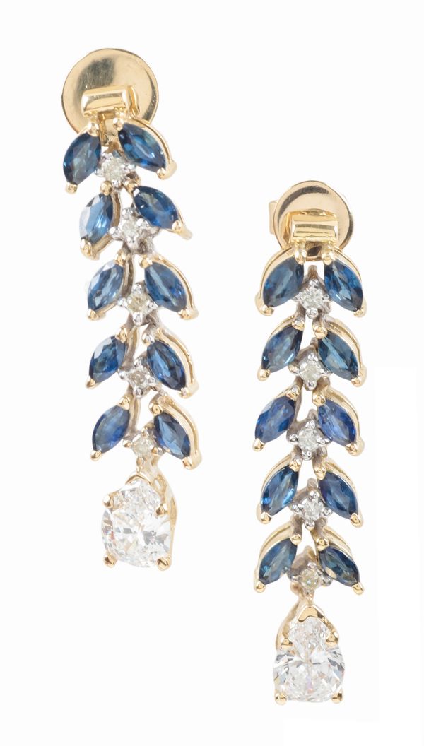 A PAIR OF ARTICULATED SAPPHIRE AND DIAMOND DROP EARRINGS