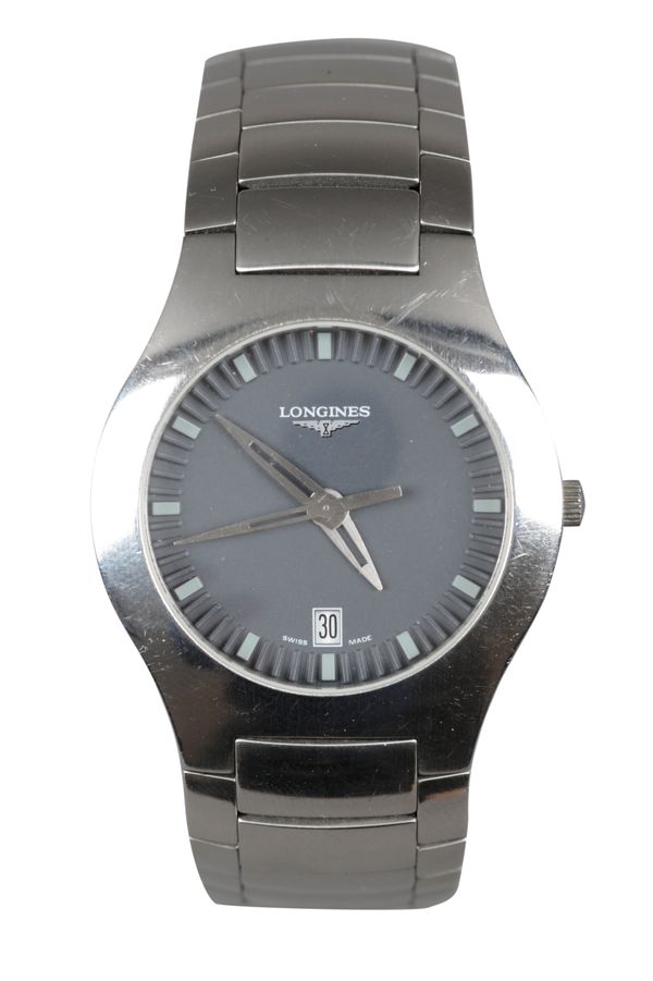 LONGINES: A STAINLESS STEEL BRACELET WATCH