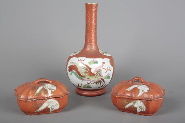 A PAIR OF JAPANESE PORCELAIN RED GLAZED BOXES AND COVERS