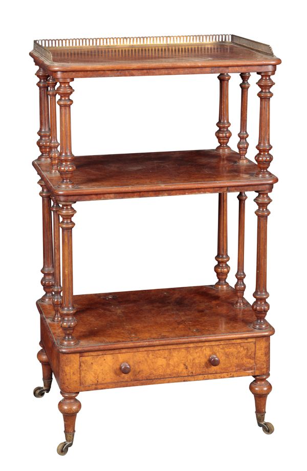 A VICTORIAN WALNUT WHATNOT ATTRIBUTED TO GILLOWS