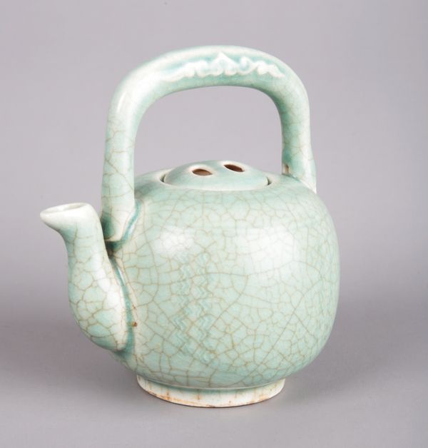 A CHINESE PORCELAIN CELADON GLAZED EWER