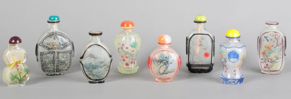 A COLLECTION OF EIGHT CHINESE REVERSE PAINTED GLASS SNUFF BOTTLES
