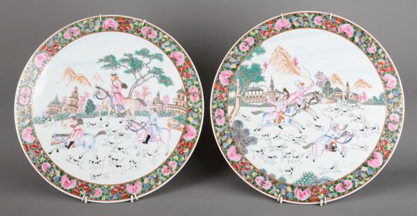 A PAIR OF CHINESE PORCELAIN FAMILLE ROSE PLAQUES