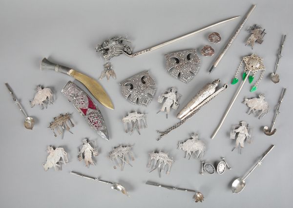 A COLLECTION OF CHINESE SILVER AND WHITE METAL WORKS OF ART