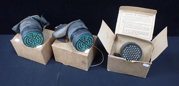 THREE WW2 GAS MASK RESPIRATORS IN THEIR BOXES