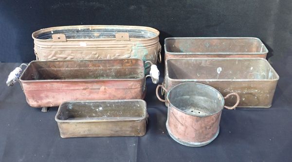 A GROUP OF COPPER AND BRASS PLANTERS