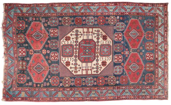 AN ANTIQUE NORTH PERSIAN RUG