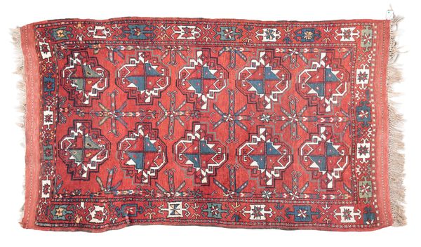 AN ANTIQUE BELUCH RUG OF TURKMEN DESIGN