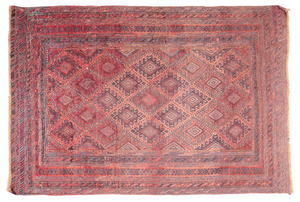 AN ANTIQUE BELUCH RUG