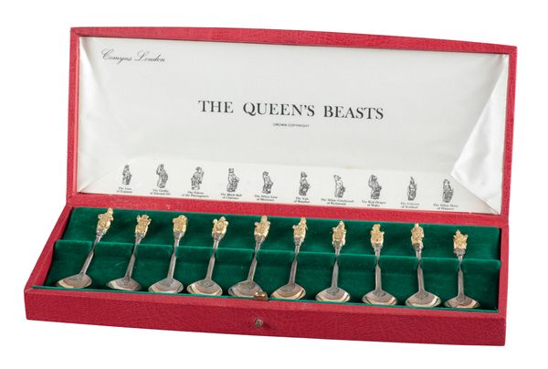 A SET OF QUEEN ELIZABETH II SILVER "BEASTS" SPOONS