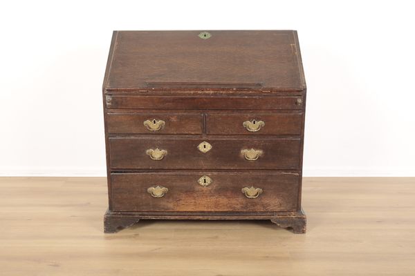 A GEORGE III PROVINCIAL OAK BUREAU